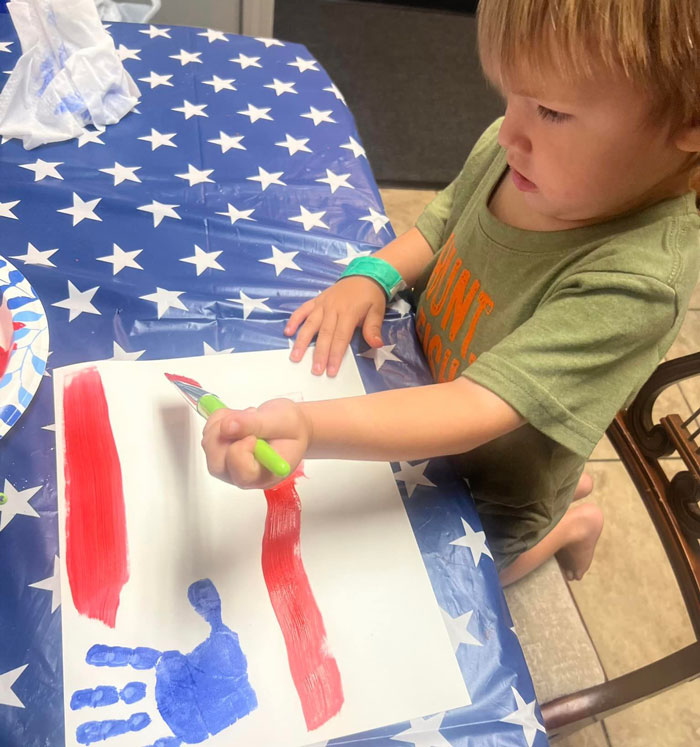 Child playing with sand | Sprouts Therapy Center